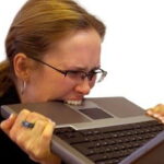 Berkeley Accupunture Lady biting her laptop